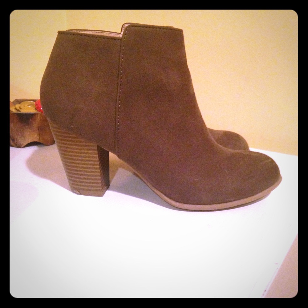 Green healed boots.